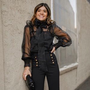 Black organza blouse.